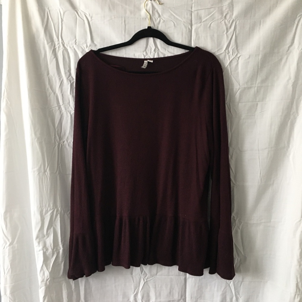 Elle peplum long sleeve sweater